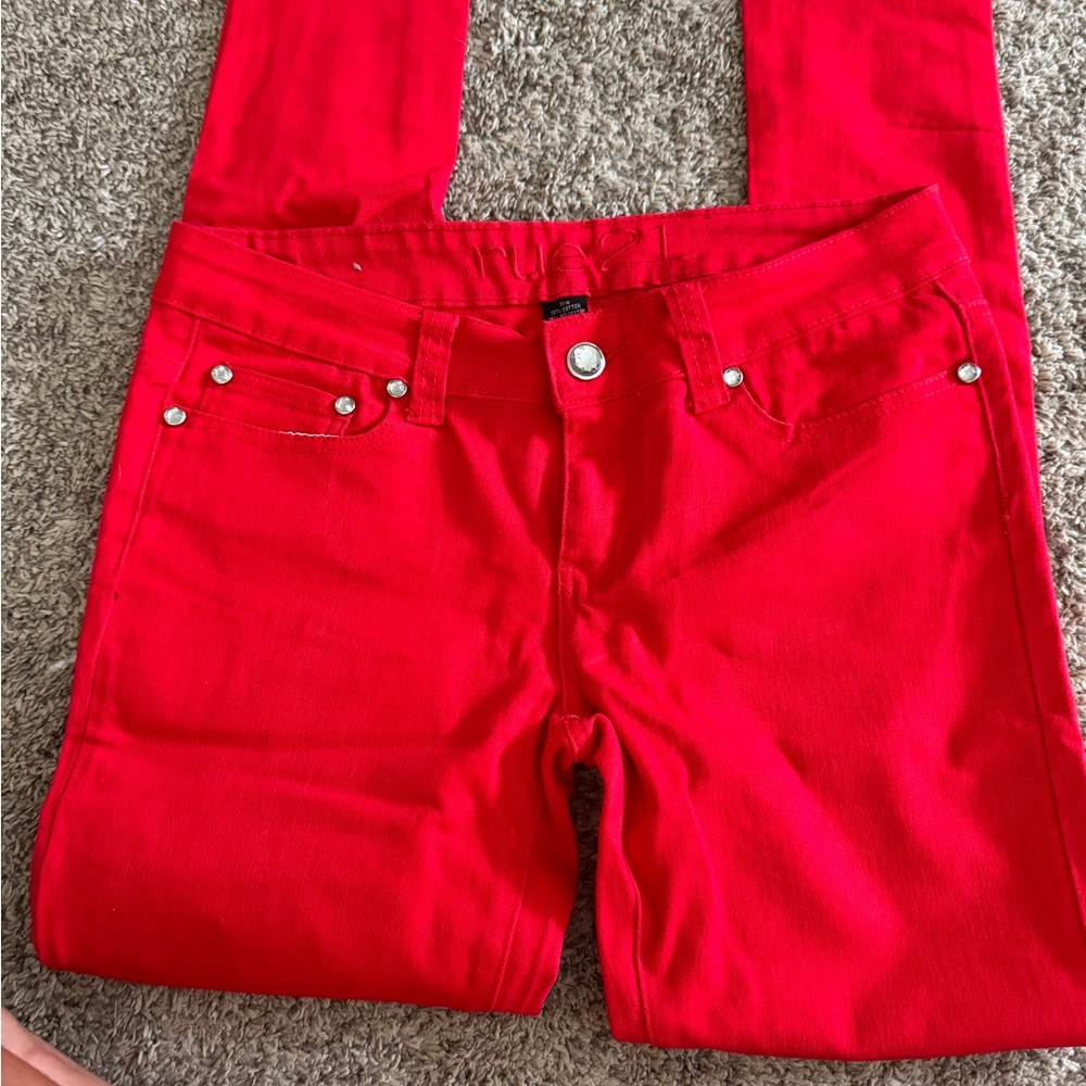 Red skinny jeans